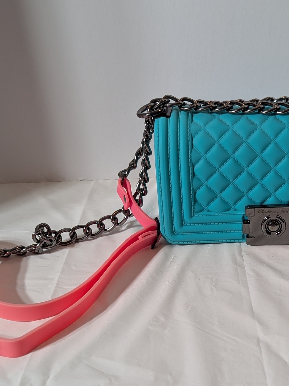 American Jewel Silicone Quilted Turquoise Crossbody Bag with Pink Strap